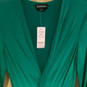 Bebe Twist front slinky gown